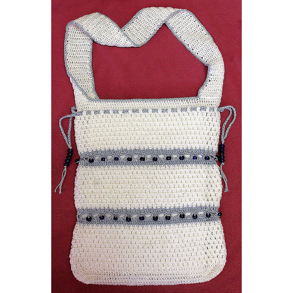Shoulder bag with broomstick and beads